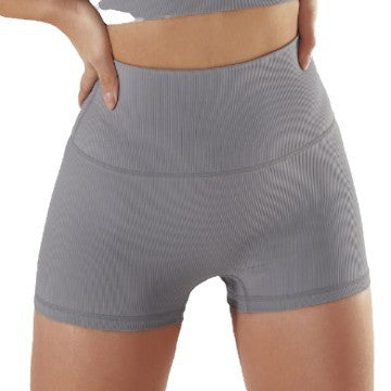 Short de yoga sans coutures de couleur unie pour femme