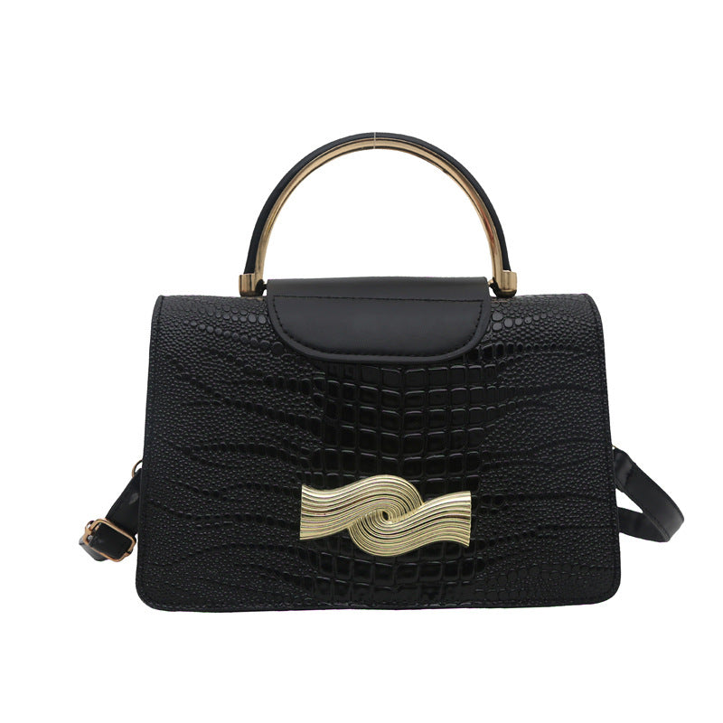 Bolso de piel de cocodrilo con hebilla de metal en color liso para mujer