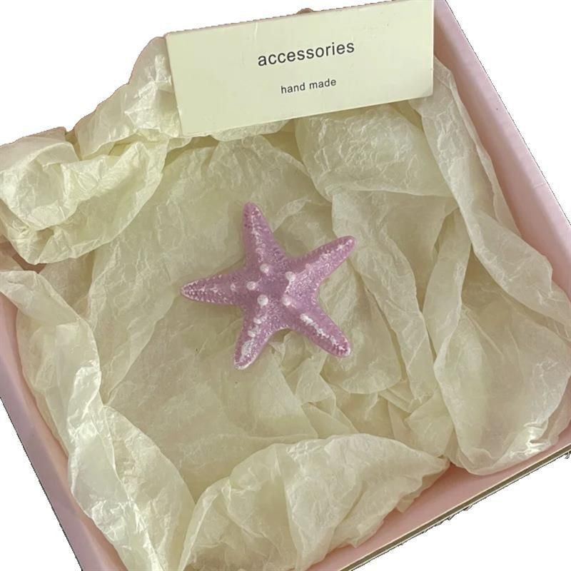 Accesorios para el cabello para vacaciones de verano junto al mar con estrellas de mar