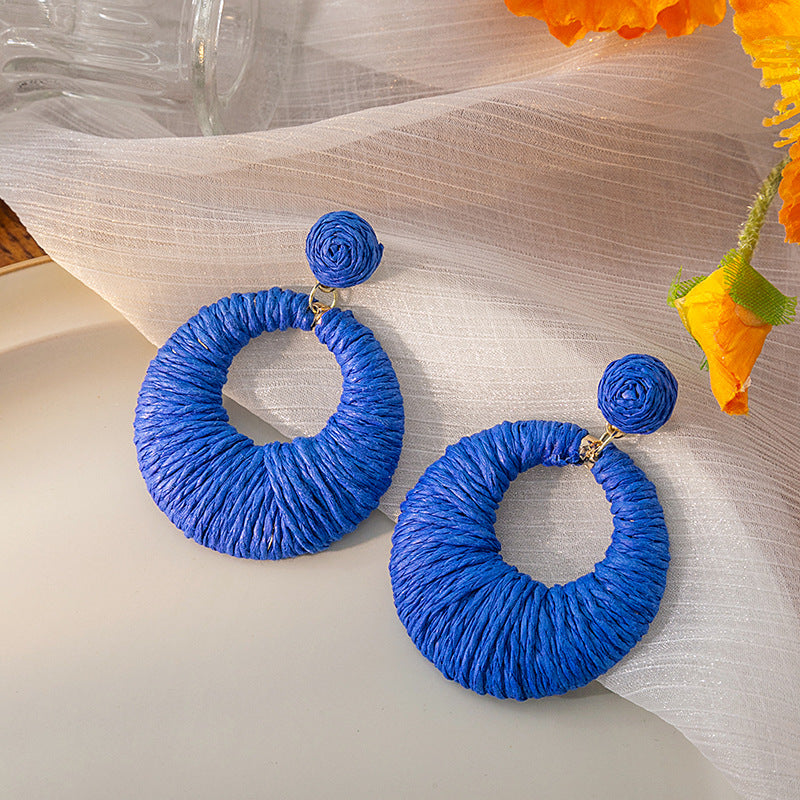 Boucles d'oreilles rondes creuses tissées de style bohème pour les fêtes