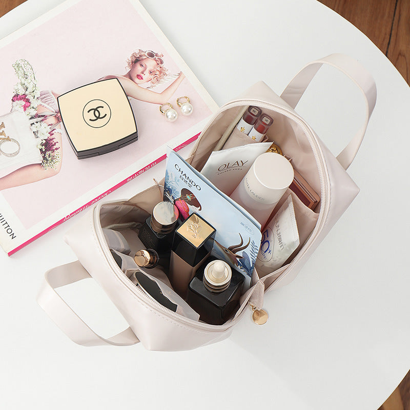 Bolsa de cosméticos portátil, sencilla y moderna, de gran capacidad para mujer.