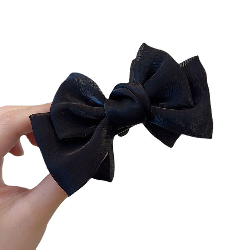Elegante broche con lazo de color liso para mujer