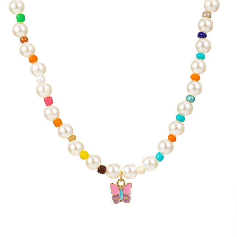 Collar bohemio de perlas y mariposas multicolor