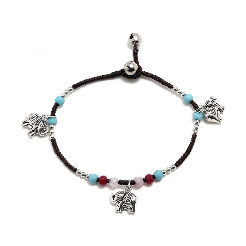 Pulsera tejida a mano con colgante de elefante bohemio