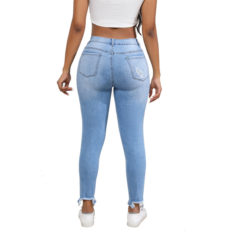 Jean extensible déchiré à taille haute pour femme