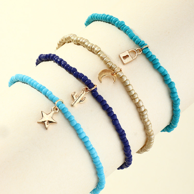 Conjunto de tobilleras con candado bohemio, estrella creciente y cactus