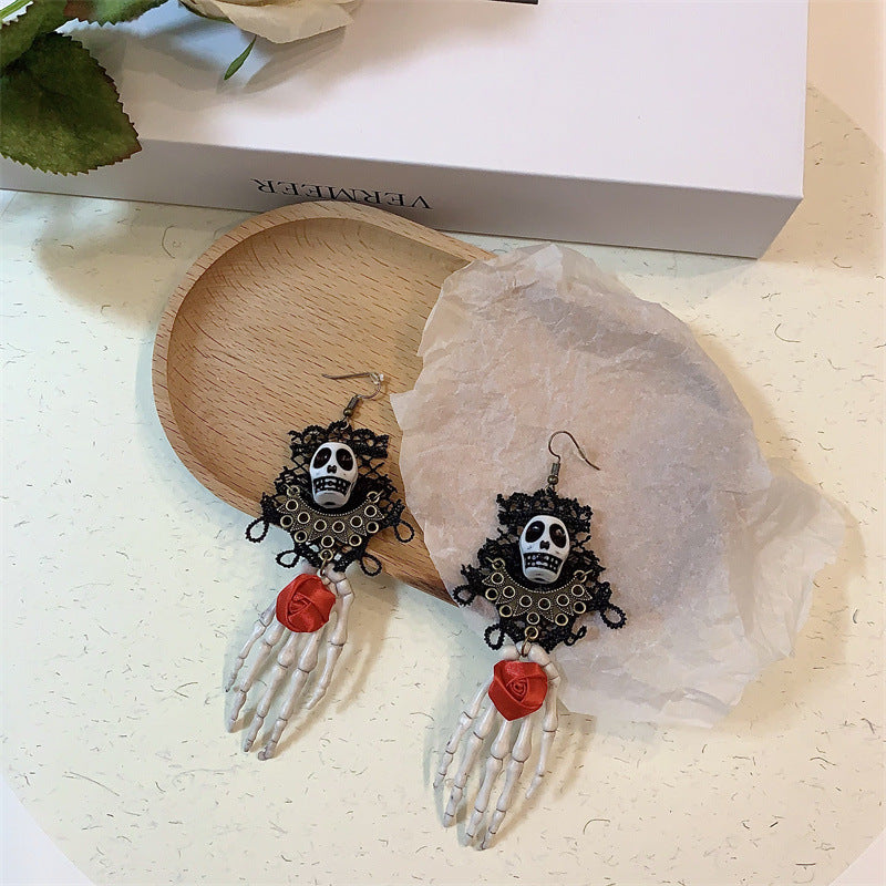 Boucles d'oreilles gothiques vintage en dentelle noire avec tête de mort