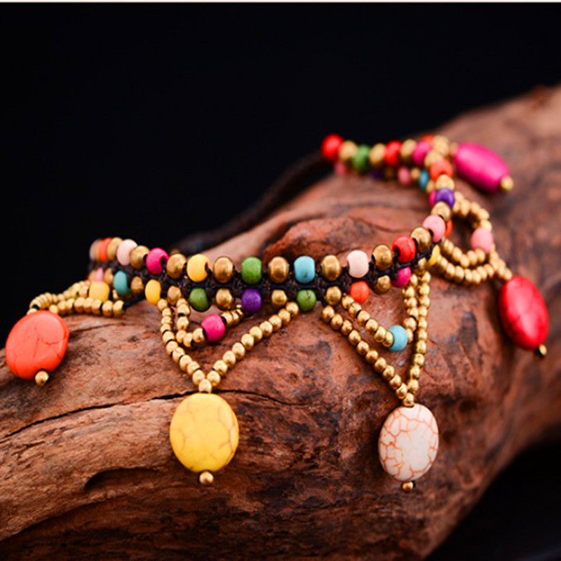 Tobillera bohemia con borlas trenzadas hechas a mano