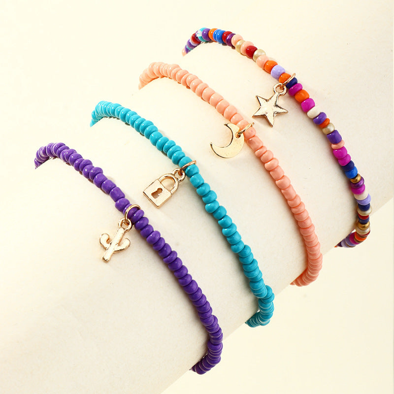 Conjunto de tobilleras con candado bohemio, estrella creciente y cactus