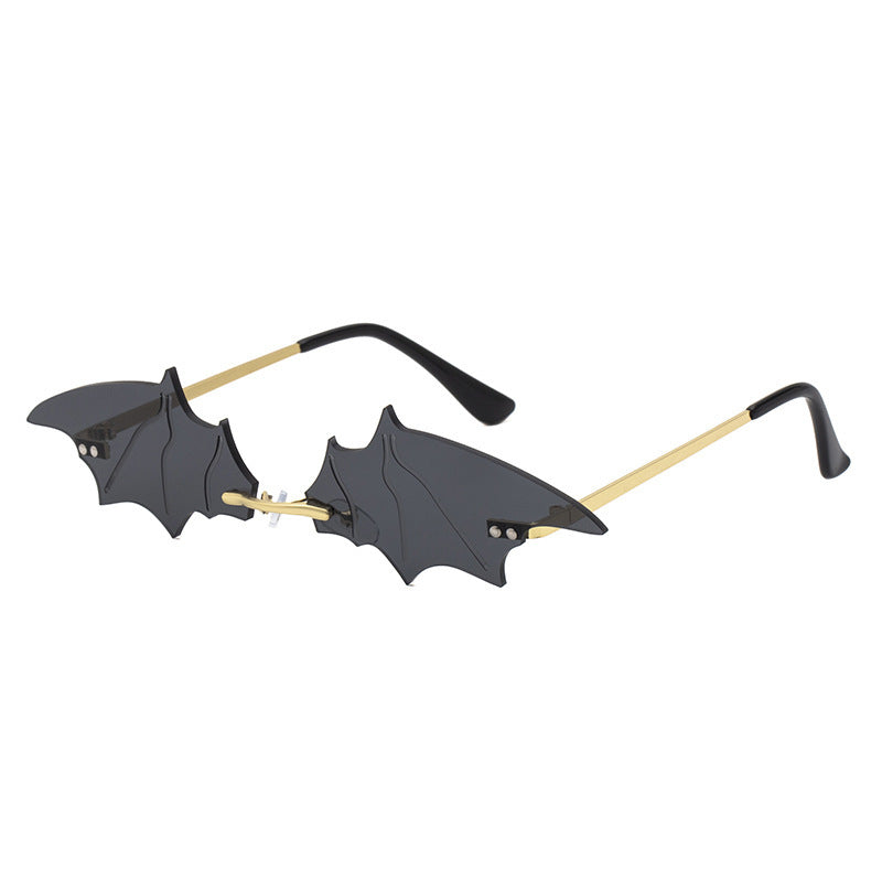 Lunettes de soleil d'Halloween à petite monture en forme de chauve-souris pour femmes