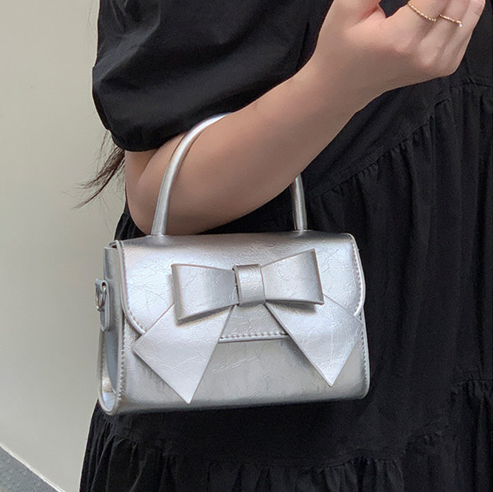 Bolso de mano pequeño cuadrado con lazo de color liso elegante para mujer