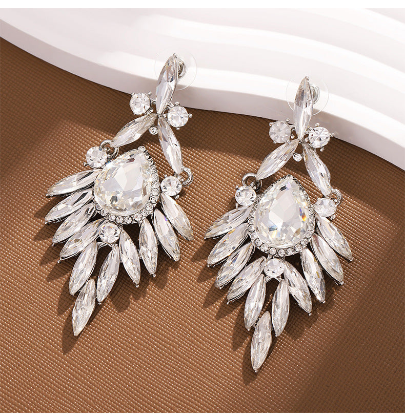 Pendientes de borlas ovaladas exageradas con diamantes de imitación y estilo geométrico para mujer
