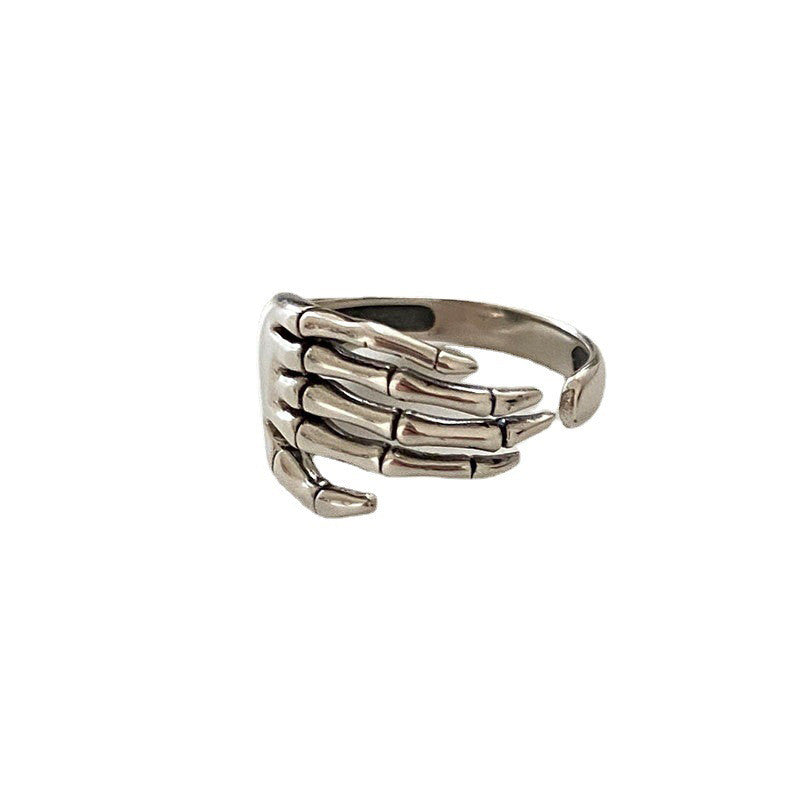 Anillo ajustable de latón plateado con diseño de esqueleto punk de Halloween.