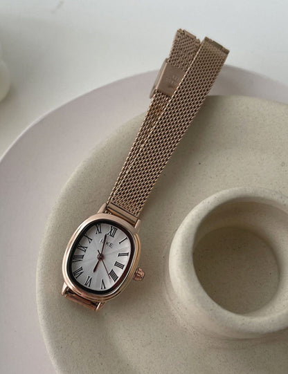 Vintage Oval Slim Strap Roman Numeral Gold Watch