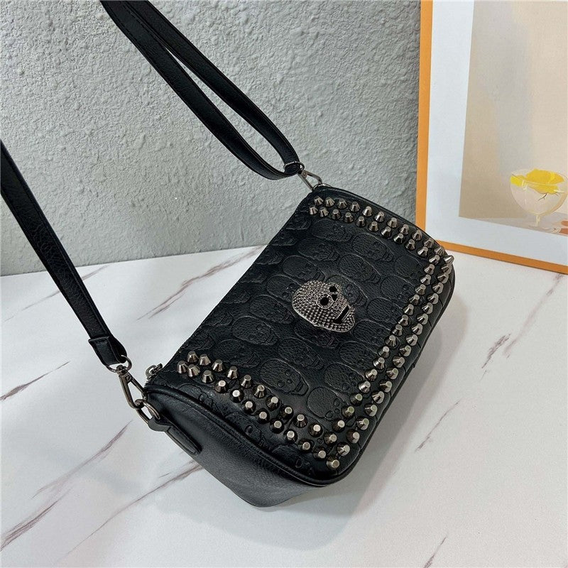 Embossed Skull Riveted Shoulder Bag