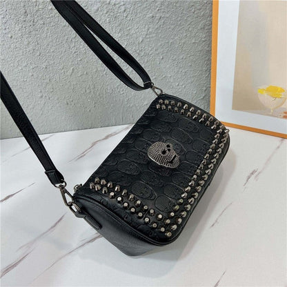 Embossed Skull Riveted Shoulder Bag