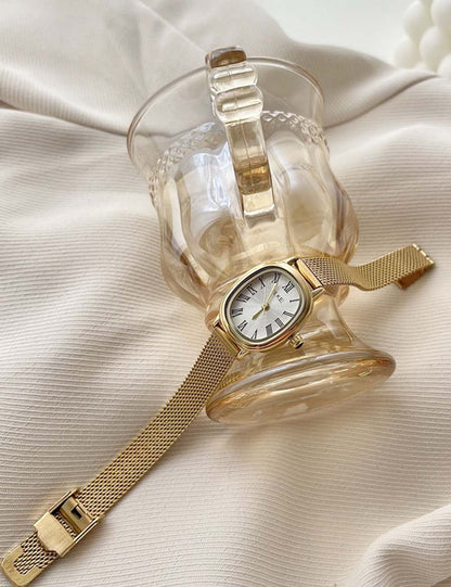 Vintage Oval Slim Strap Roman Numeral Gold Watch