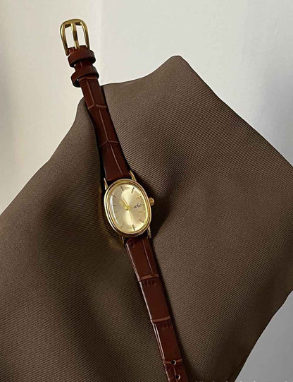 Elegant Small Oval Dial Leather Strap Quartz Watch