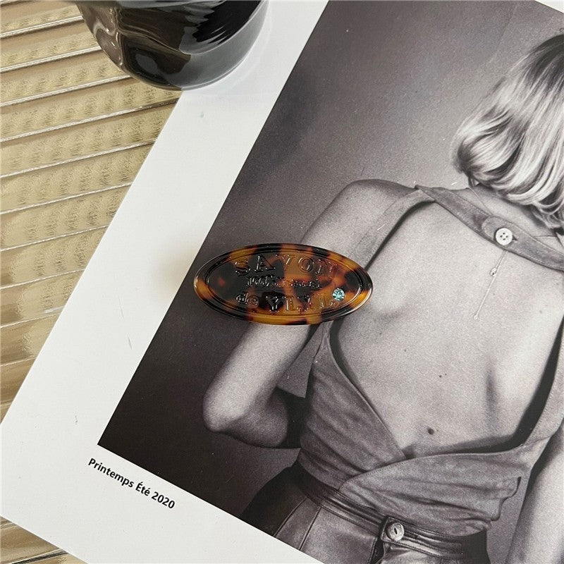 Elliptical Spring Alphabet Crystal Hair Clip