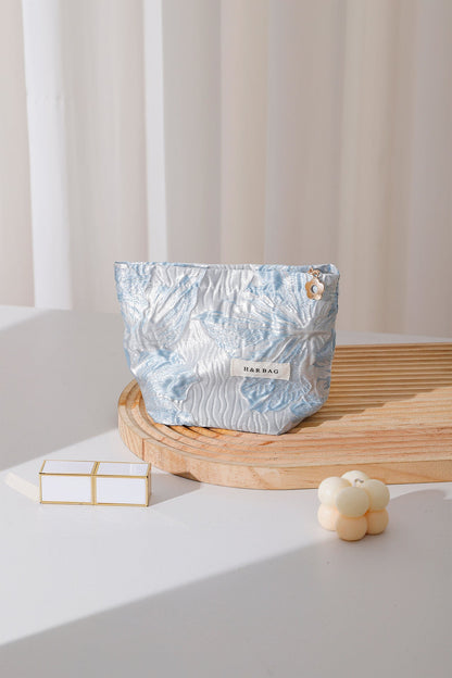 Simple Embossed Flower Makeup Bag