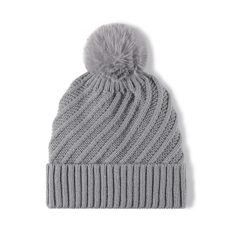 Solid Color Ripped Knit Pom Beanie