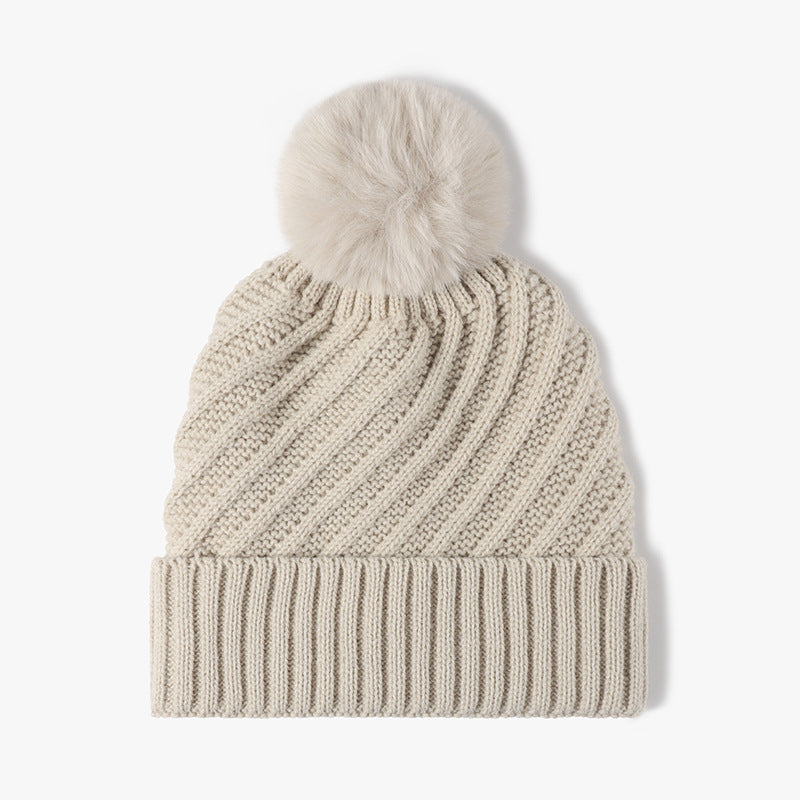 Solid Color Ripped Knit Pom Beanie