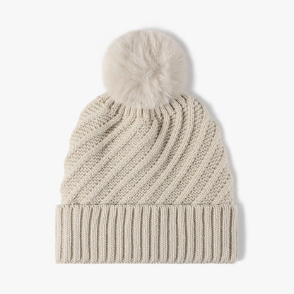 Solid Color Ripped Knit Pom Beanie