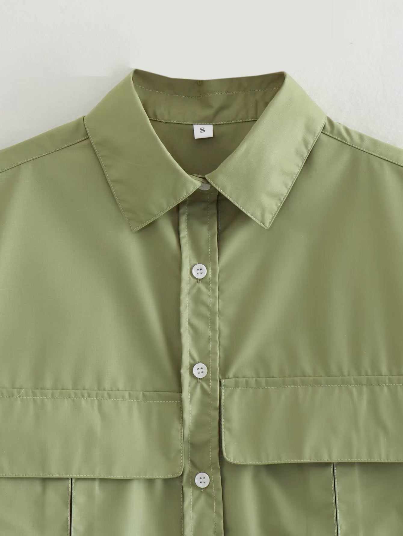 Pockets Irregular Lapel Sleeveless Shirts