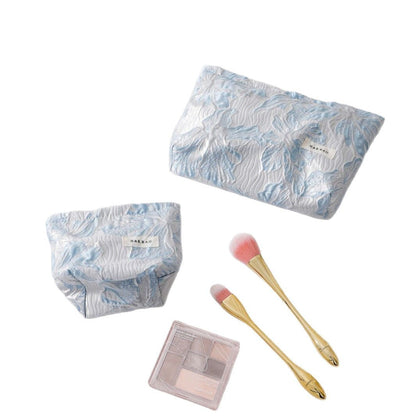 Simple Embossed Flower Makeup Bag