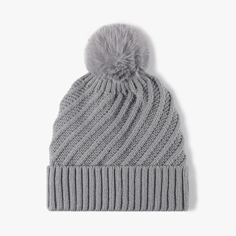 Solid Color Ripped Knit Pom Beanie