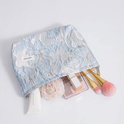 Simple Embossed Flower Makeup Bag