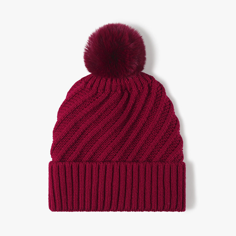Solid Color Ripped Knit Pom Beanie