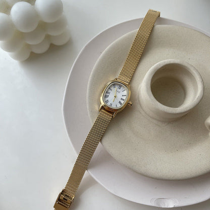 Vintage Oval Slim Strap Roman Numeral Gold Watch