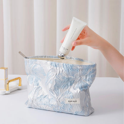 Simple Embossed Flower Makeup Bag