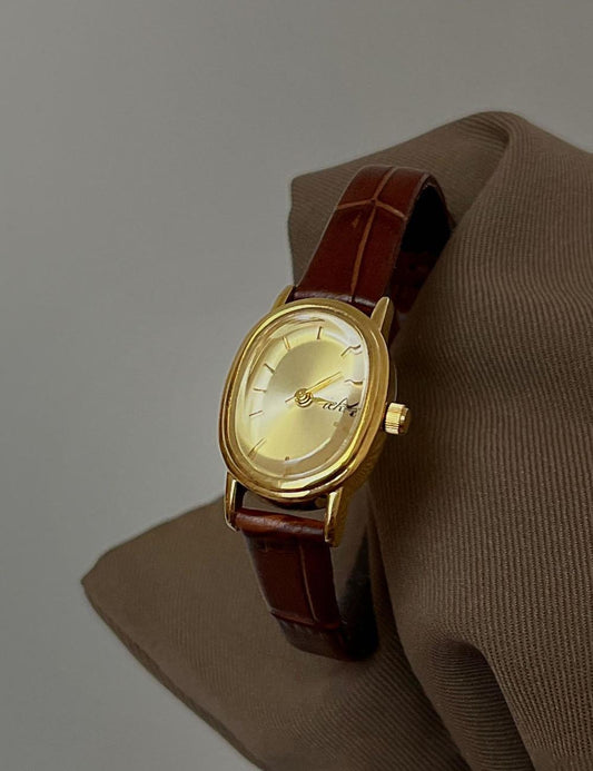 Elegant Small Oval Dial Leather Strap Quartz Watch