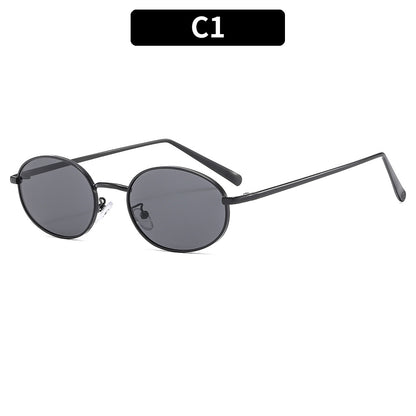 Gafas de sol ovaladas retro con montura metálica elegante
