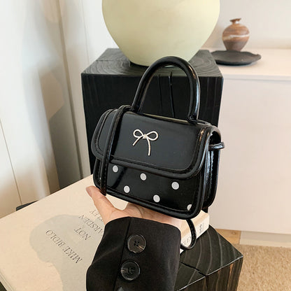Mini bolso bandolera cuadrado con lazo de moda