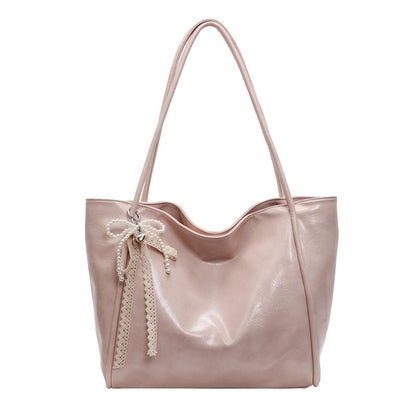 Bolso tote retro de piel encerada con aceite para mujer con colgante de lazo