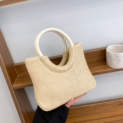 Bolso circular tejido de paja informal de moda para mujer con estilo artístico
