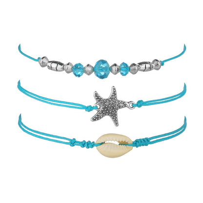 Conjunto de tobillera con cuentas azules, estrellas de mar y conchas bohemias