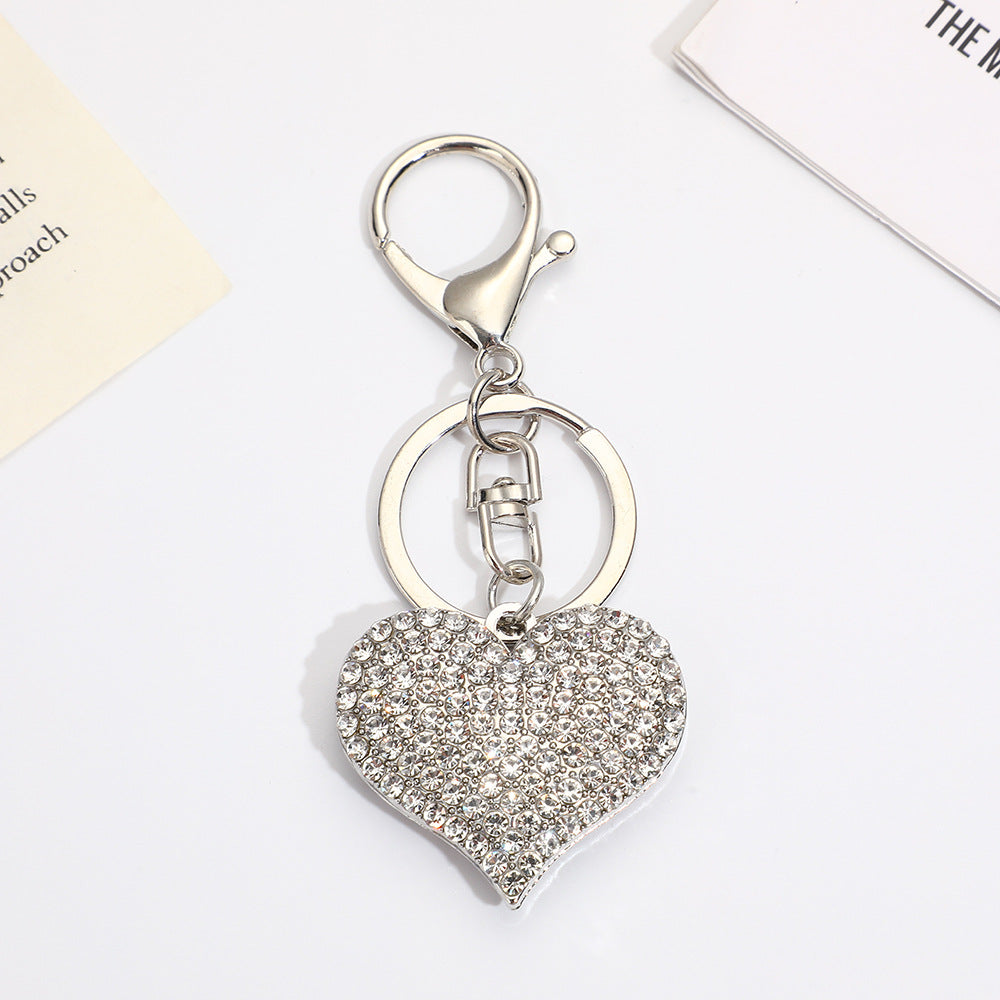 Llavero con colgante de corazón de diamantes de imitación para mujer