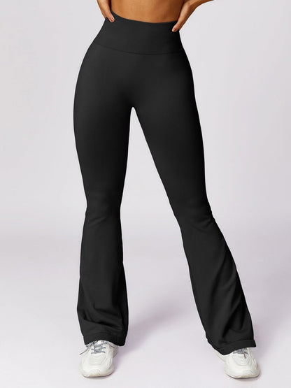Pantalones deportivos acampanados de color liso de moda de yoga para mujer