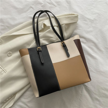 Bolso de mano de gran capacidad con costuras de moda en color