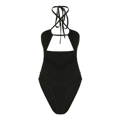 Traje de baño sexy de una pieza con cuello halter y cordones en color sólido