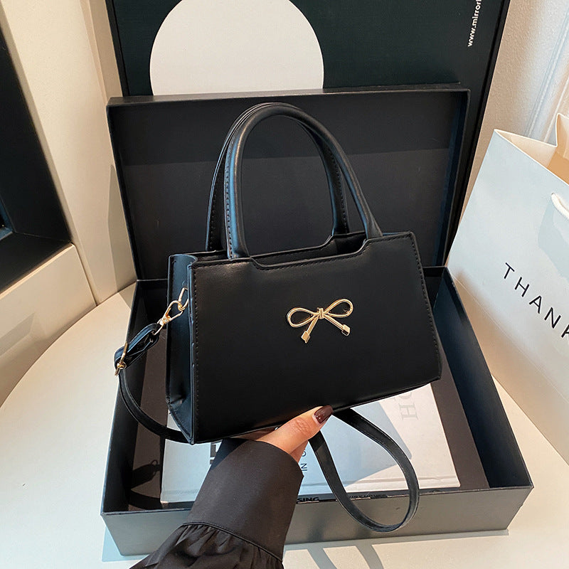 Bolso de mano informal de PU de color sólido con hebilla de lazo para mujer