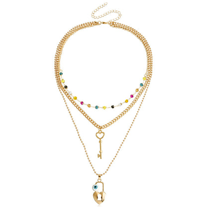Collar con llave de corazón y cuentas multicolores bohemias