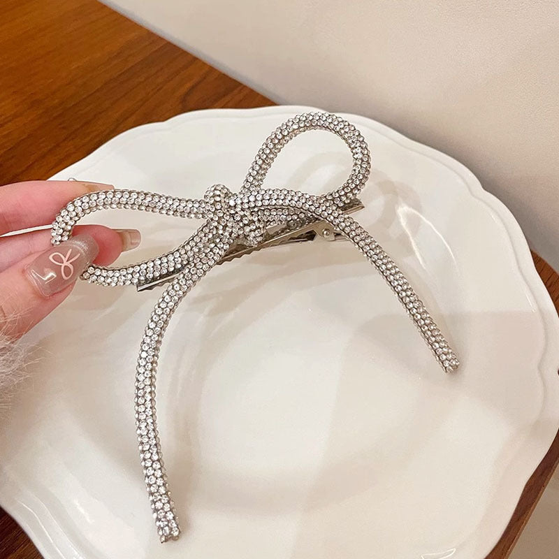 Horquilla con lazo de diamantes de imitación de color liso para mujer - Estilo aleación