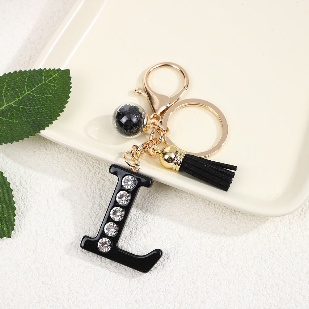 Llavero de resina negra con letras de diamantes de imitación, accesorio de arte moderno