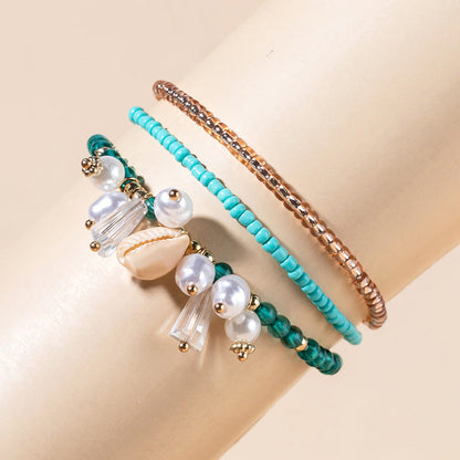 Conjunto de pulseras elásticas de cuentas de arroz multicolor bohemias