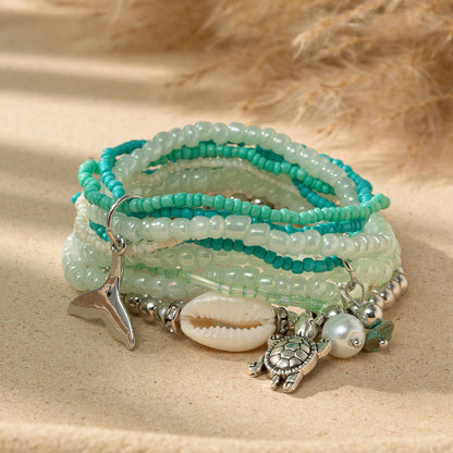 Conjunto de pulseras elásticas de cuentas de arroz multicolor bohemias